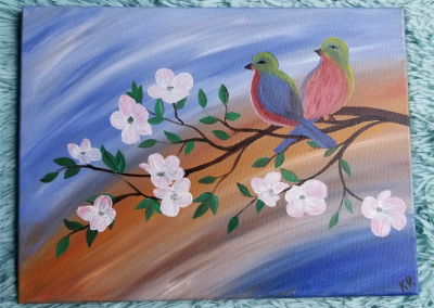 Love Birds sitting on branch